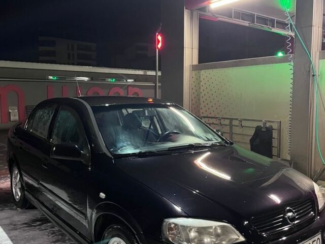Черный Опель Астра, объемом двигателя 1.4 л и пробегом 338 тыс. км за 2300 $, фото 2 на Automoto.ua