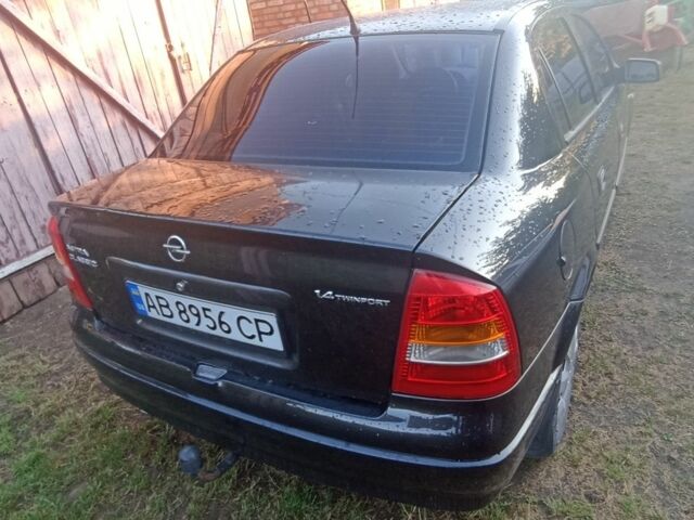 Черный Опель Астра, объемом двигателя 1.4 л и пробегом 129 тыс. км за 3700 $, фото 13 на Automoto.ua