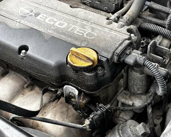 Черный Опель Астра, объемом двигателя 1.4 л и пробегом 277 тыс. км за 3300 $, фото 19 на Automoto.ua