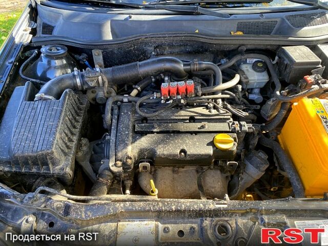 Черный Опель Астра, объемом двигателя 1.4 л и пробегом 168 тыс. км за 2450 $, фото 9 на Automoto.ua