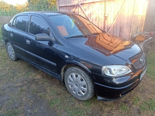 Черный Опель Астра, объемом двигателя 1.4 л и пробегом 129 тыс. км за 3700 $, фото 17 на Automoto.ua