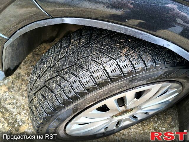 Черный Опель Астра, объемом двигателя 1.4 л и пробегом 250 тыс. км за 3999 $, фото 7 на Automoto.ua