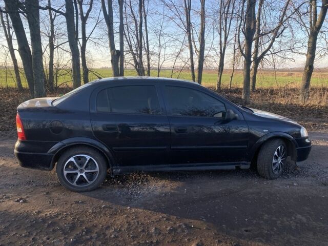 Черный Опель Астра, объемом двигателя 1.4 л и пробегом 219 тыс. км за 3400 $, фото 10 на Automoto.ua