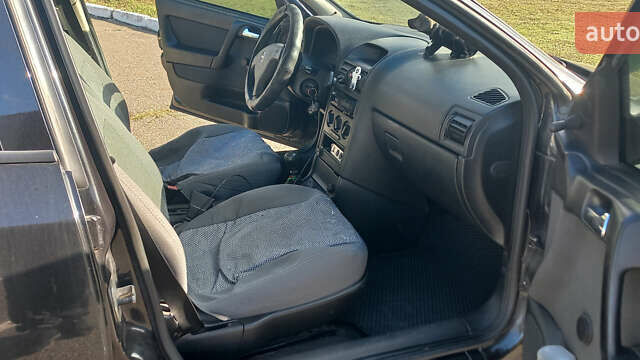 Чорний Опель Астра, об'ємом двигуна 1.36 л та пробігом 290 тис. км за 3900 $, фото 4 на Automoto.ua