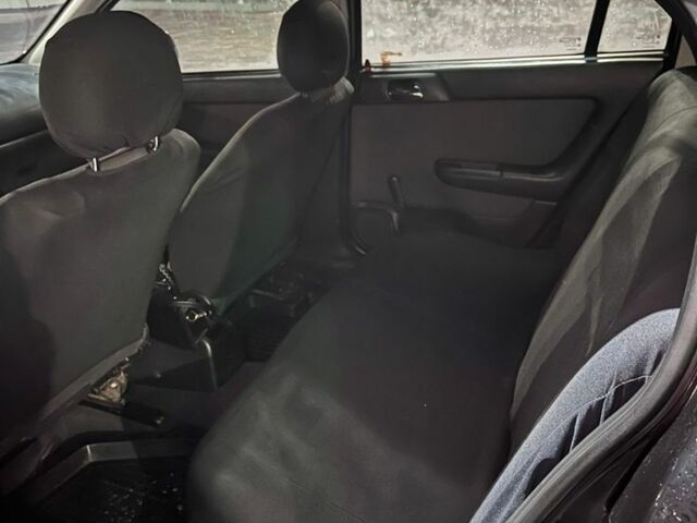 Черный Опель Астра, объемом двигателя 1.4 л и пробегом 338 тыс. км за 2300 $, фото 7 на Automoto.ua