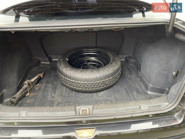 Чорний Опель Астра, об'ємом двигуна 1.36 л та пробігом 198 тис. км за 3950 $, фото 14 на Automoto.ua