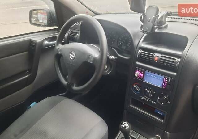 Черный Опель Астра, объемом двигателя 1.6 л и пробегом 277 тыс. км за 3400 $, фото 11 на Automoto.ua