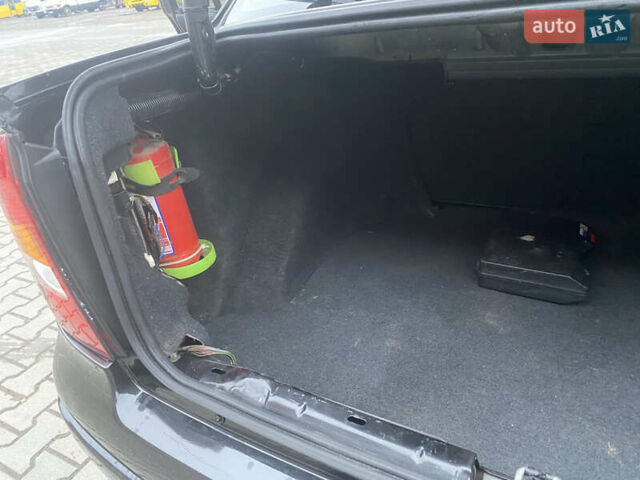 Черный Опель Астра, объемом двигателя 1.4 л и пробегом 229 тыс. км за 3200 $, фото 18 на Automoto.ua