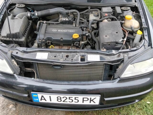 Черный Опель Астра, объемом двигателя 1 л и пробегом 166 тыс. км за 3500 $, фото 2 на Automoto.ua
