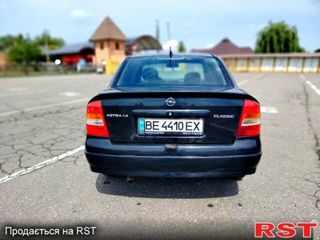 Черный Опель Астра, объемом двигателя 1.4 л и пробегом 320 тыс. км за 3300 $, фото 2 на Automoto.ua