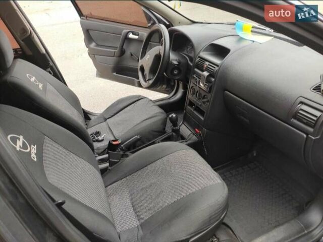 Черный Опель Астра, объемом двигателя 1.39 л и пробегом 231 тыс. км за 4200 $, фото 6 на Automoto.ua