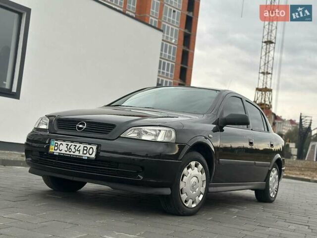 Черный Опель Астра, объемом двигателя 1.4 л и пробегом 216 тыс. км за 3999 $, фото 13 на Automoto.ua