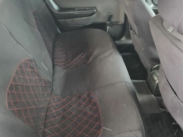 Черный Опель Астра, объемом двигателя 1.6 л и пробегом 254 тыс. км за 2400 $, фото 4 на Automoto.ua