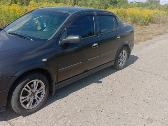 Черный Опель Астра, объемом двигателя 0 л и пробегом 200 тыс. км за 2006 $, фото 3 на Automoto.ua