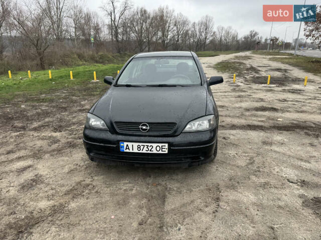 Черный Опель Астра, объемом двигателя 1.7 л и пробегом 300 тыс. км за 2999 $, фото 1 на Automoto.ua