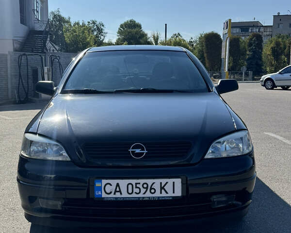 Чорний Опель Астра, об'ємом двигуна 1.6 л та пробігом 176 тис. км за 4700 $, фото 1 на Automoto.ua