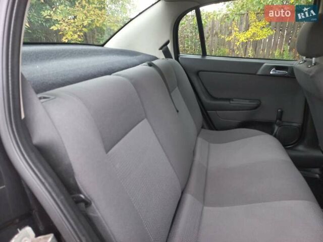 Черный Опель Астра, объемом двигателя 1.4 л и пробегом 220 тыс. км за 4500 $, фото 12 на Automoto.ua