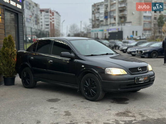 Черный Опель Астра, объемом двигателя 1.4 л и пробегом 102 тыс. км за 3600 $, фото 7 на Automoto.ua