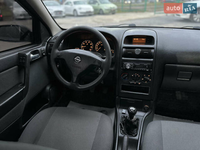 Черный Опель Астра, объемом двигателя 1.4 л и пробегом 102 тыс. км за 3600 $, фото 24 на Automoto.ua