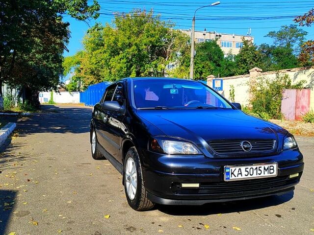 Черный Опель Астра, объемом двигателя 1.4 л и пробегом 141 тыс. км за 3500 $, фото 1 на Automoto.ua
