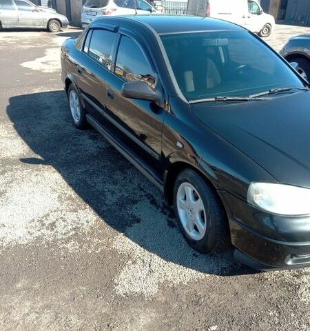 Черный Опель Астра, объемом двигателя 1.6 л и пробегом 164 тыс. км за 4500 $, фото 2 на Automoto.ua