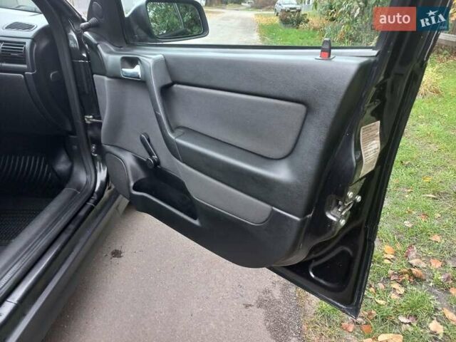 Черный Опель Астра, объемом двигателя 1.4 л и пробегом 220 тыс. км за 4500 $, фото 15 на Automoto.ua