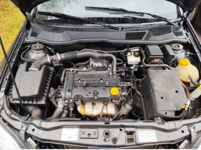 Черный Опель Астра, объемом двигателя 1.4 л и пробегом 176 тыс. км за 3850 $, фото 1 на Automoto.ua