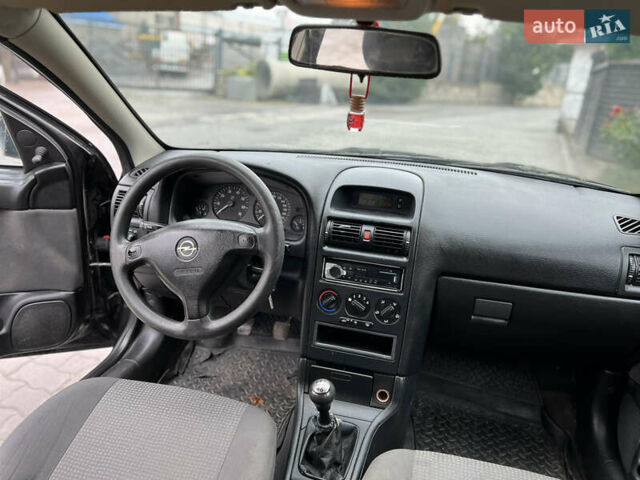 Черный Опель Астра, объемом двигателя 1.4 л и пробегом 157 тыс. км за 2500 $, фото 13 на Automoto.ua