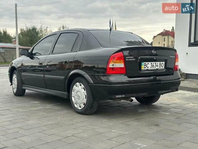 Черный Опель Астра, объемом двигателя 1.4 л и пробегом 216 тыс. км за 3999 $, фото 10 на Automoto.ua