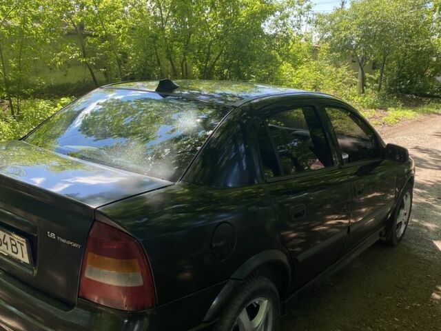 Черный Опель Астра, объемом двигателя 1.6 л и пробегом 470 тыс. км за 3000 $, фото 5 на Automoto.ua