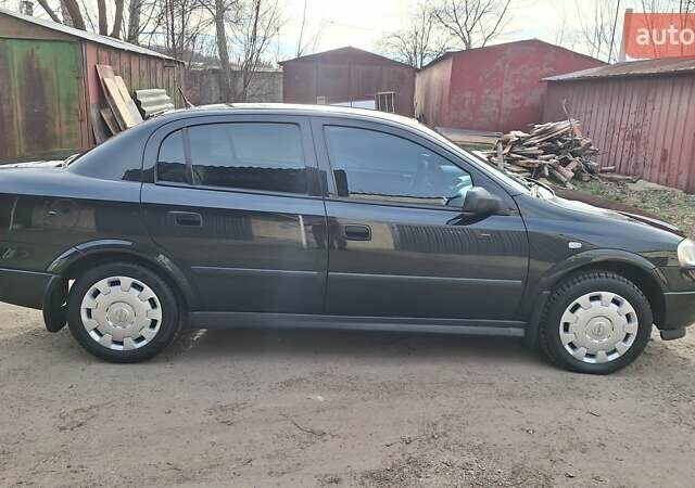 Чорний Опель Астра, об'ємом двигуна 1.6 л та пробігом 52 тис. км за 5600 $, фото 5 на Automoto.ua