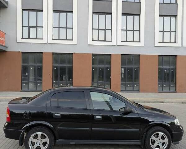 Черный Опель Астра, объемом двигателя 1.6 л и пробегом 215 тыс. км за 3900 $, фото 9 на Automoto.ua