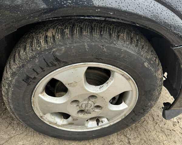 Черный Опель Астра, объемом двигателя 1.7 л и пробегом 300 тыс. км за 2999 $, фото 4 на Automoto.ua