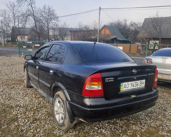 Черный Опель Астра, объемом двигателя 1.39 л и пробегом 180 тыс. км за 2550 $, фото 2 на Automoto.ua