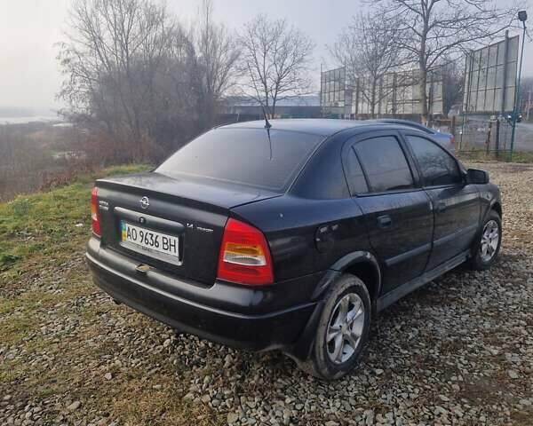 Черный Опель Астра, объемом двигателя 1.39 л и пробегом 180 тыс. км за 2550 $, фото 1 на Automoto.ua