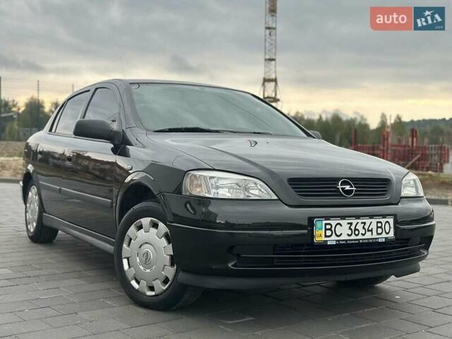 Черный Опель Астра, объемом двигателя 1.4 л и пробегом 216 тыс. км за 3999 $, фото 3 на Automoto.ua