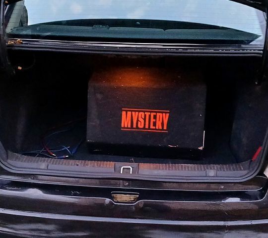 Черный Опель Астра, объемом двигателя 1.6 л и пробегом 256 тыс. км за 3300 $, фото 3 на Automoto.ua