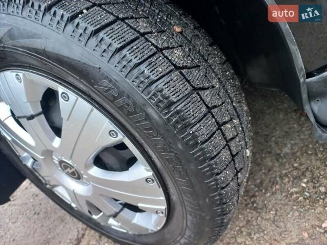 Черный Опель Астра, объемом двигателя 1.4 л и пробегом 230 тыс. км за 4500 $, фото 22 на Automoto.ua