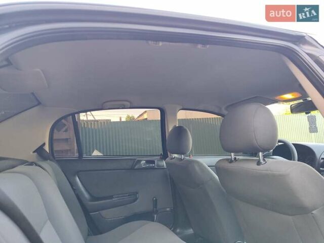 Черный Опель Астра, объемом двигателя 1.6 л и пробегом 100 тыс. км за 2800 $, фото 10 на Automoto.ua