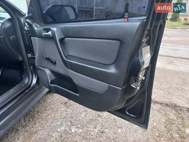 Черный Опель Астра, объемом двигателя 1.4 л и пробегом 230 тыс. км за 4500 $, фото 18 на Automoto.ua