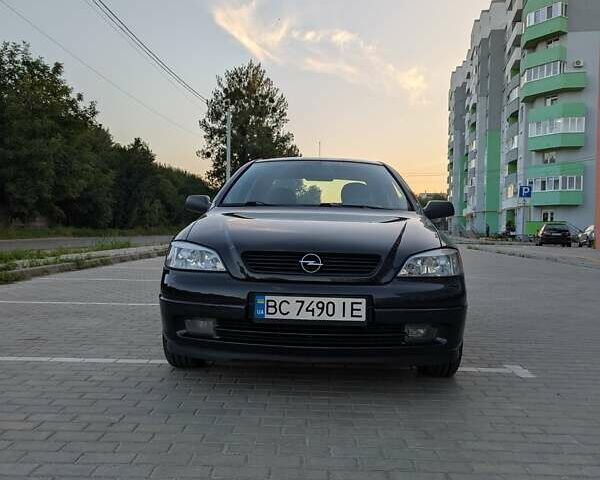 Черный Опель Астра, объемом двигателя 1.6 л и пробегом 215 тыс. км за 3900 $, фото 13 на Automoto.ua