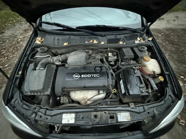 Черный Опель Астра, объемом двигателя 1.6 л и пробегом 250 тыс. км за 3750 $, фото 22 на Automoto.ua