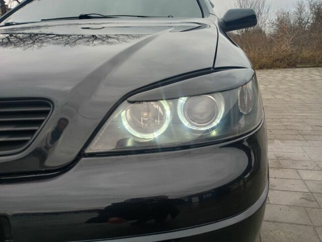 Чорний Опель Астра, об'ємом двигуна 1.4 л та пробігом 222 тис. км за 3400 $, фото 5 на Automoto.ua