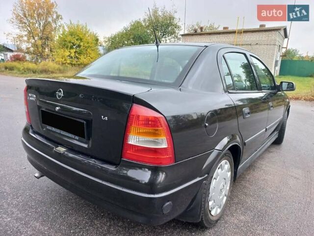 Черный Опель Астра, объемом двигателя 1.4 л и пробегом 230 тыс. км за 4500 $, фото 3 на Automoto.ua