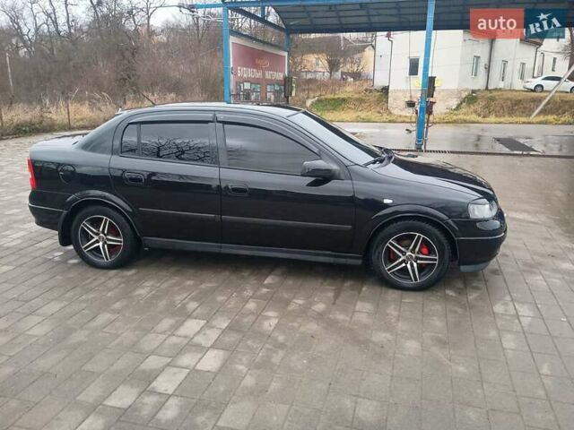 Чорний Опель Астра, об'ємом двигуна 1.4 л та пробігом 222 тис. км за 3400 $, фото 7 на Automoto.ua