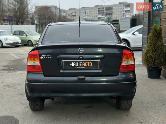 Черный Опель Астра, объемом двигателя 1.4 л и пробегом 102 тыс. км за 3600 $, фото 10 на Automoto.ua
