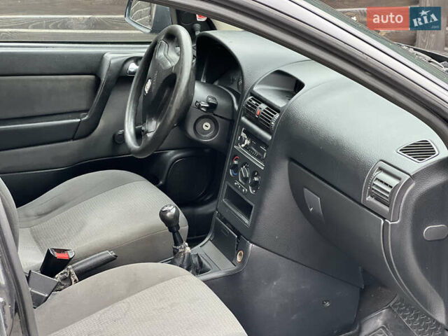 Черный Опель Астра, объемом двигателя 1.4 л и пробегом 157 тыс. км за 2500 $, фото 26 на Automoto.ua