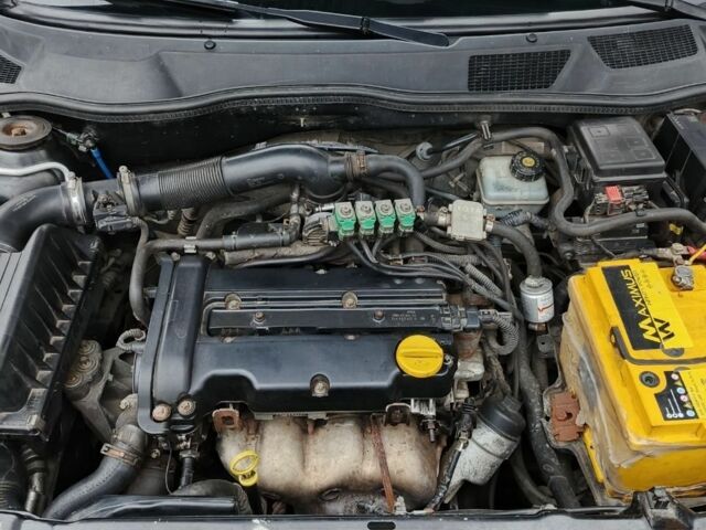 Черный Опель Астра, объемом двигателя 1.4 л и пробегом 175 тыс. км за 148000 $, фото 6 на Automoto.ua