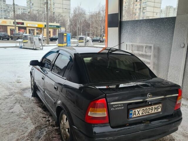 Черный Опель Астра, объемом двигателя 1.6 л и пробегом 254 тыс. км за 2400 $, фото 1 на Automoto.ua