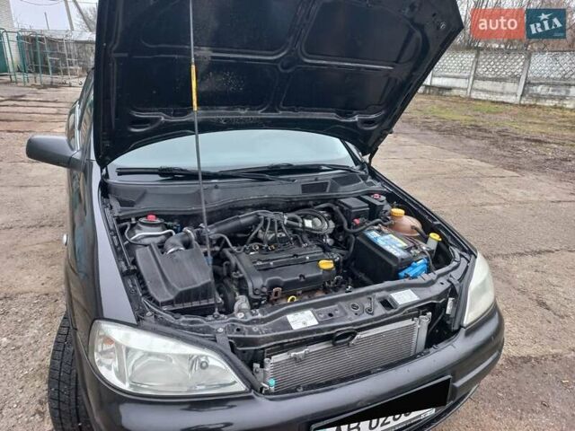 Черный Опель Астра, объемом двигателя 1.4 л и пробегом 230 тыс. км за 4500 $, фото 9 на Automoto.ua